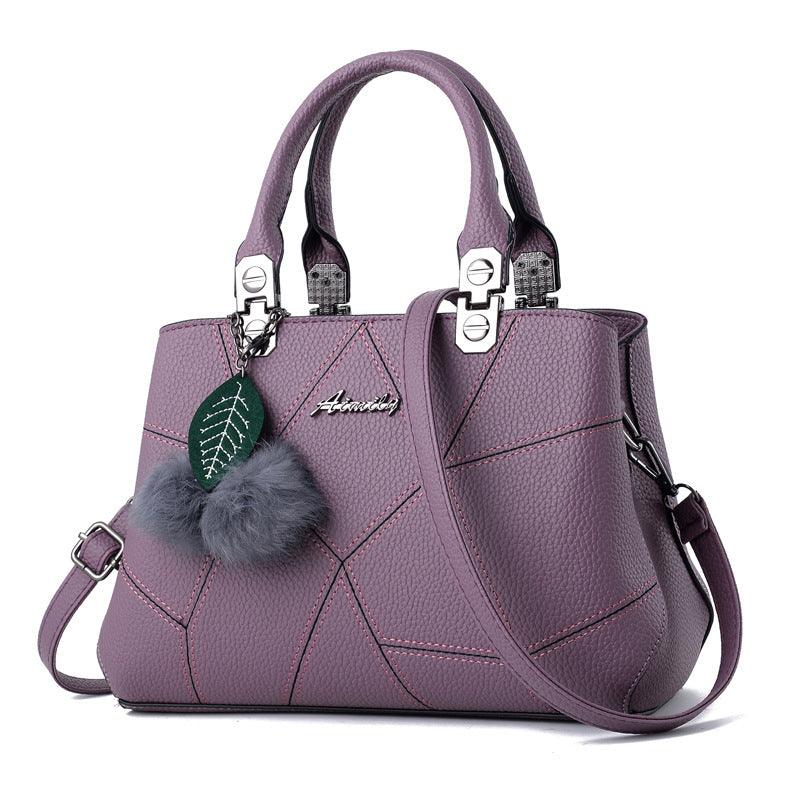 Ladies Fashion Handbag: Stylish Design with Shoulder Strap and Ball Pendant - MAKKITT